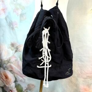 Vintage Y2K Roxy B & W Lace Up Front Cinch Tassel Closure Bucket Style Hobo Bag